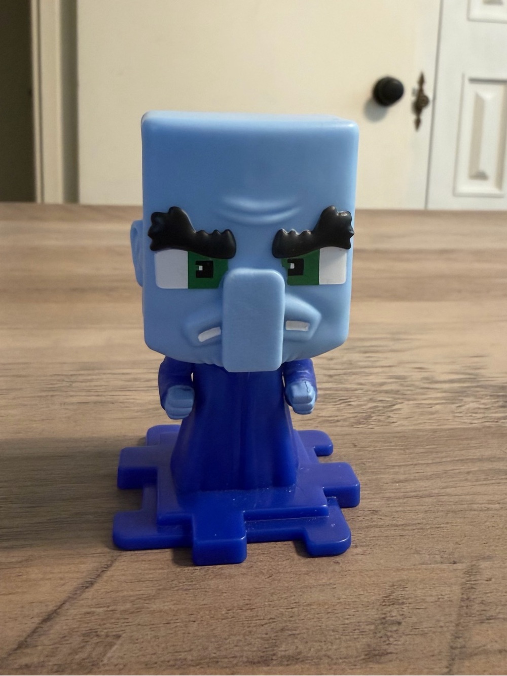 McDonald's Blue Squid-Faced Kid's Toy Figure with Green Eyes
